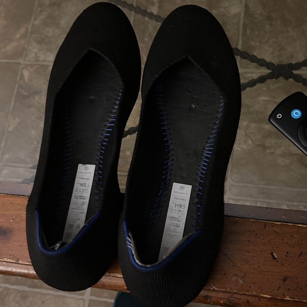 Rothy’s size 8.5. Solid black, missing insert but in excellent condition.